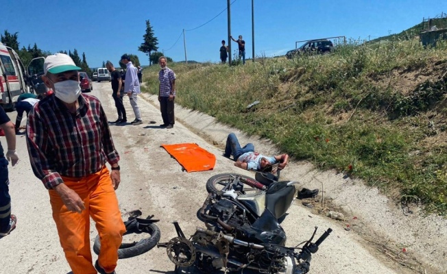 Bigadiç'te otomobille çarpışan motosikletteki 2 kişi yaralandı