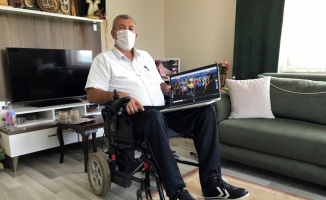 Kocaeli Büyükşehir Belediyesinden bedensel engelli muhtara dizüstü bilgisayar desteği