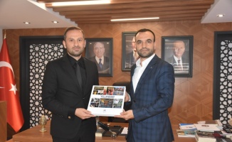 AA Bursa Bölge Müdürü Aksoy'dan MHP Bursa İl Başkanlığı'na ziyaret